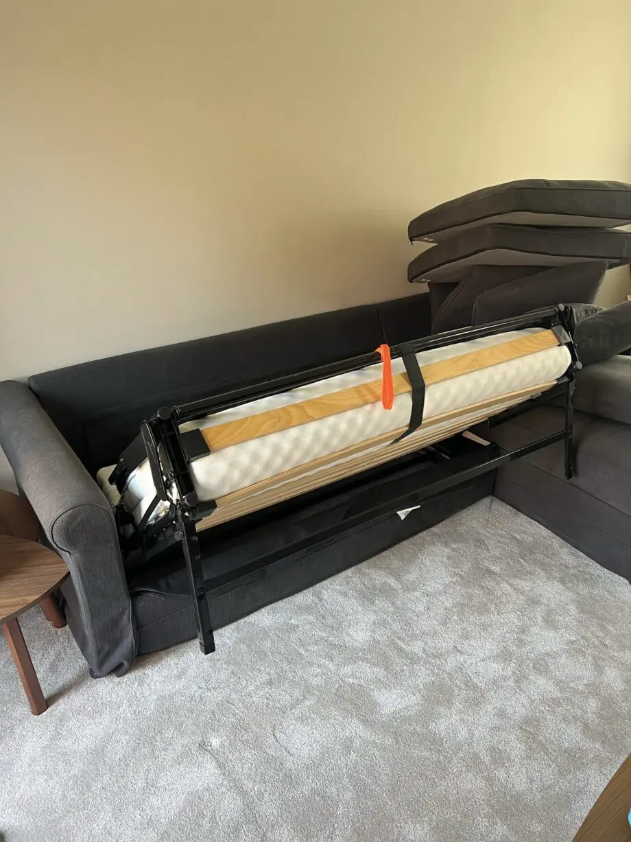 IKEA grey sofa bed with storage