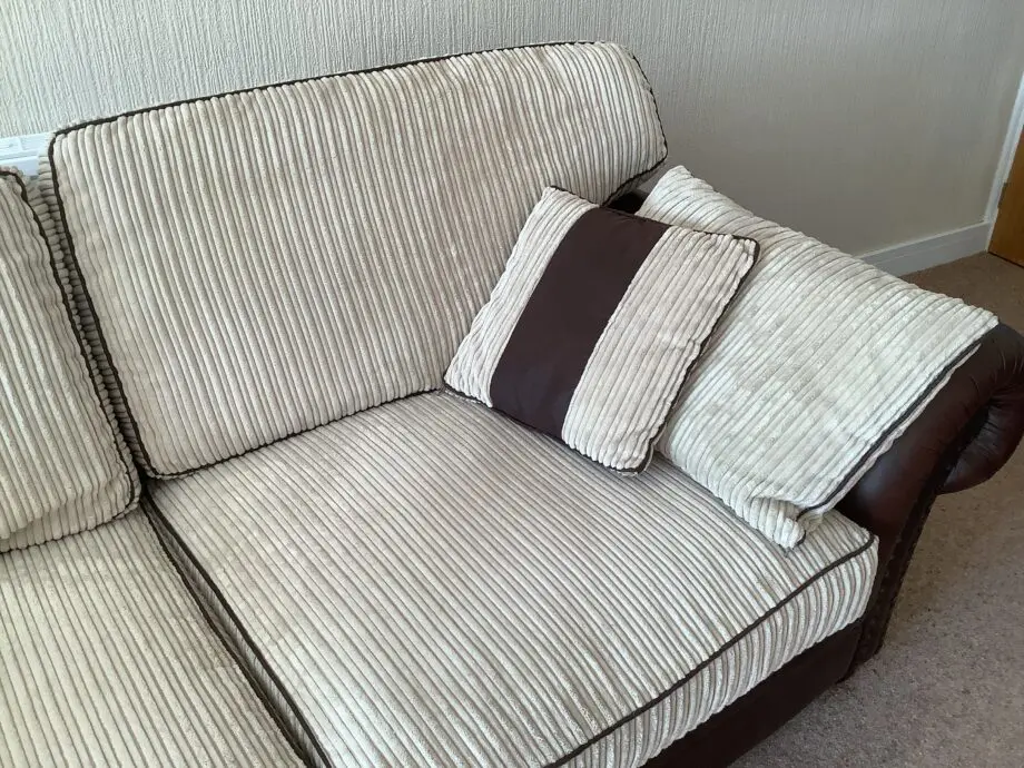 Brown Leather & Fabric Sofa with Soft Cream Cushions