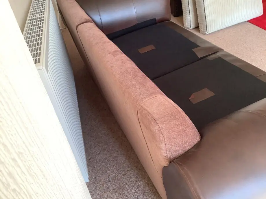 Brown Leather & Fabric Sofa with Soft Cream Cushions