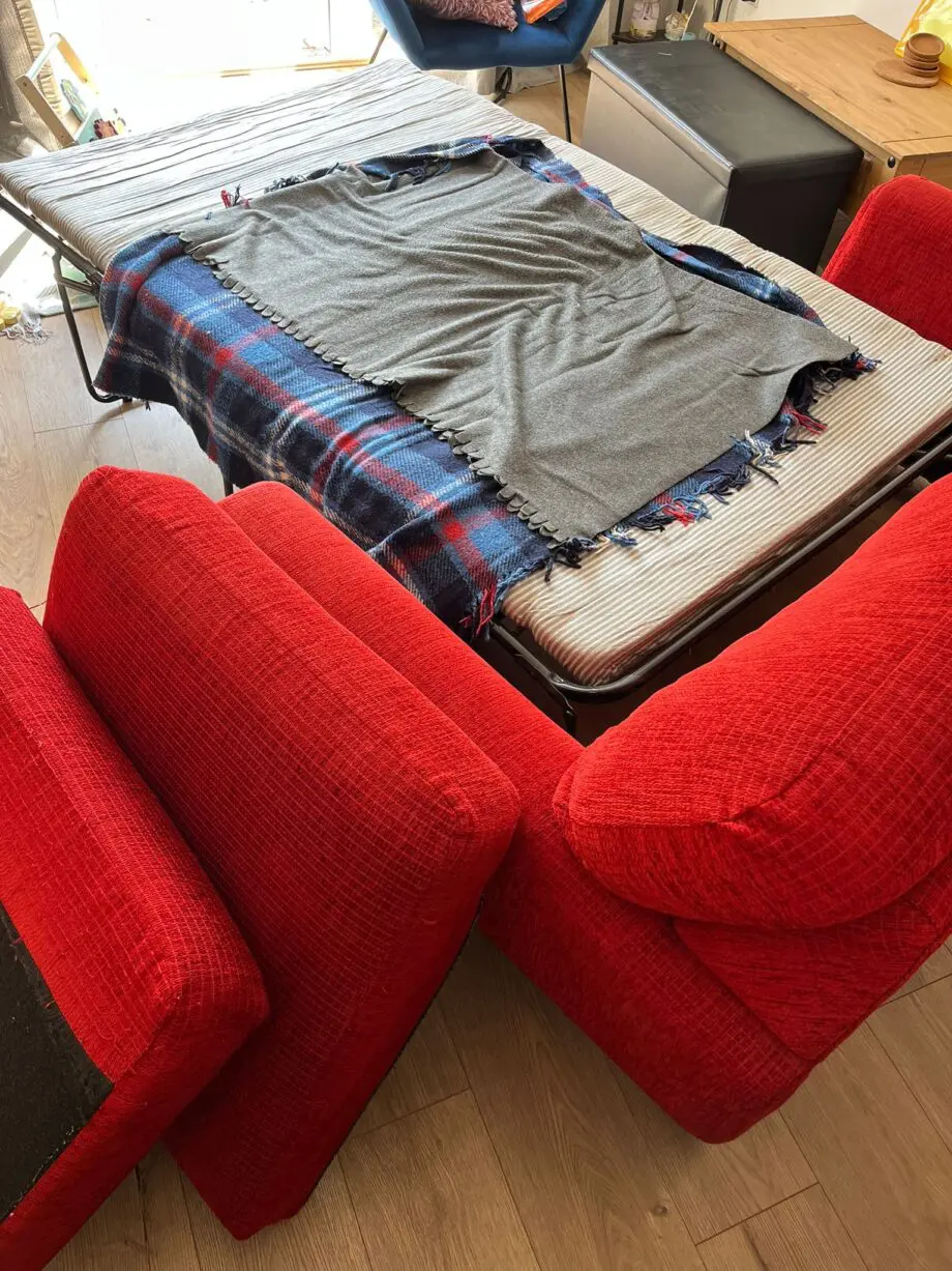 Red fold out sofa bed