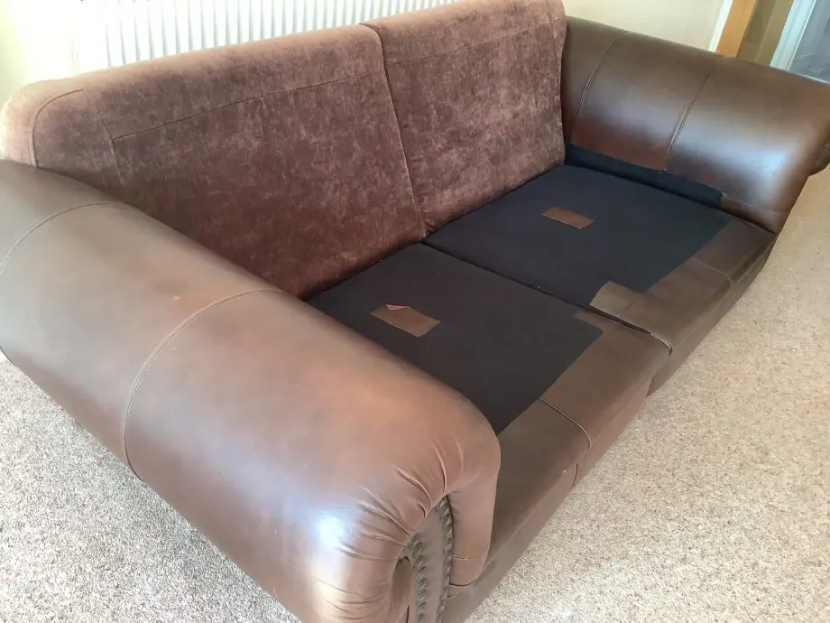 Brown Leather & Fabric Sofa with Soft Cream Cushions