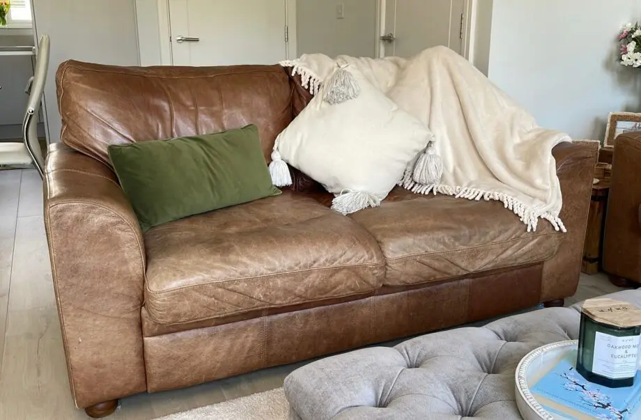 Vintage leather sofa x2 (TImothy Oulton Halo) and footstool