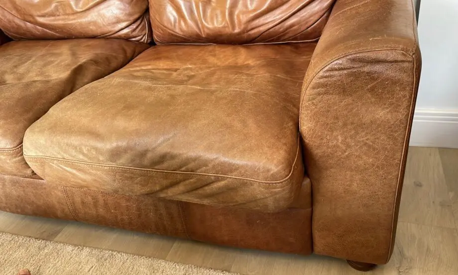 Vintage leather sofa x2 (TImothy Oulton Halo) and footstool