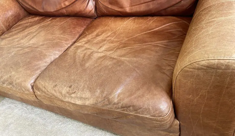 Vintage leather sofa x2 (TImothy Oulton Halo) and footstool