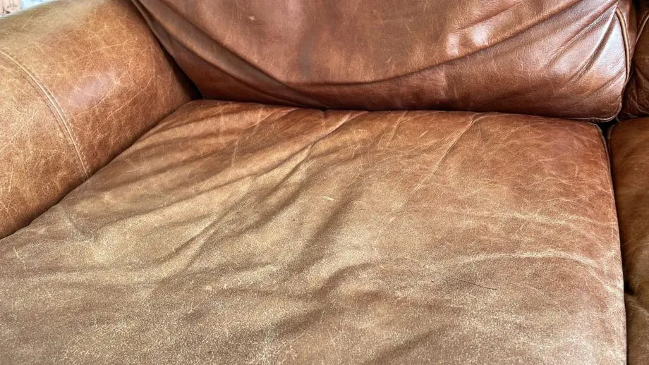 Vintage leather sofa x2 (TImothy Oulton Halo) and footstool