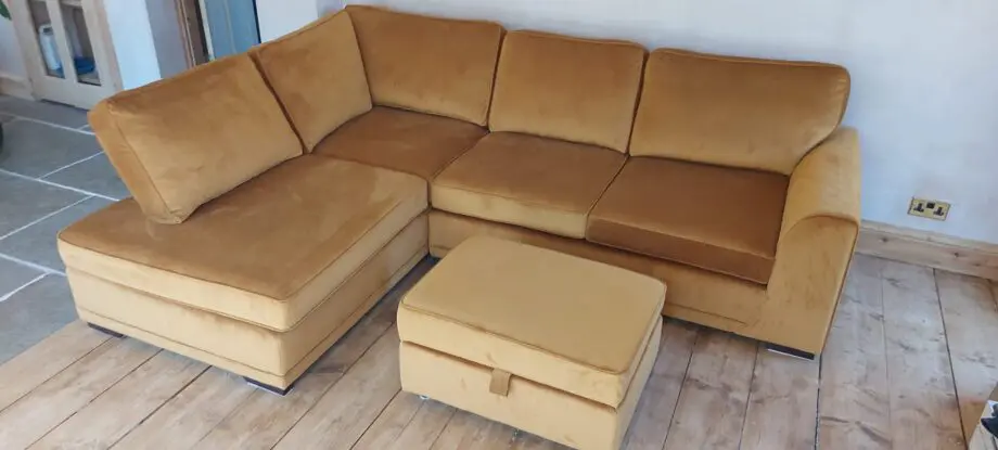 DFS Corner Sofa in velvet cinnamon & storage footstool