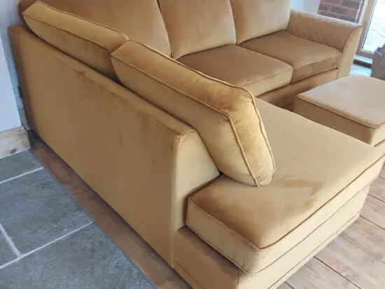 DFS Corner Sofa in velvet cinnamon & storage footstool