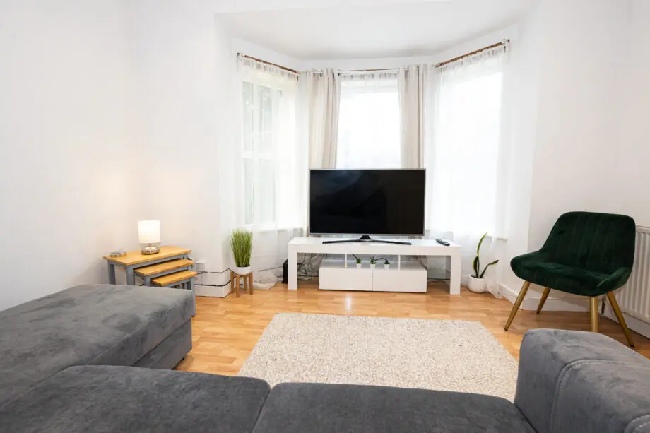 Grey L-shaped sofa bed