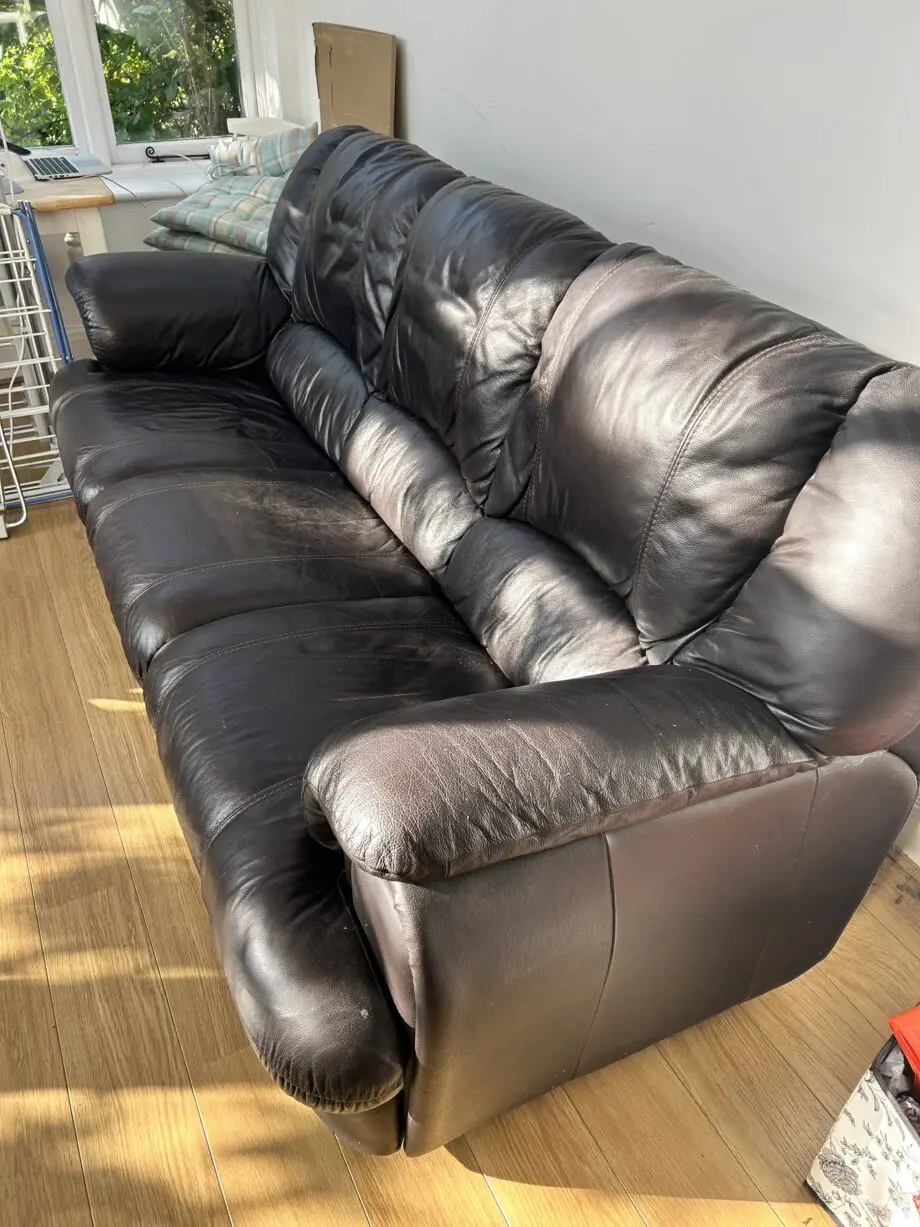 Brown faux leather sofa
