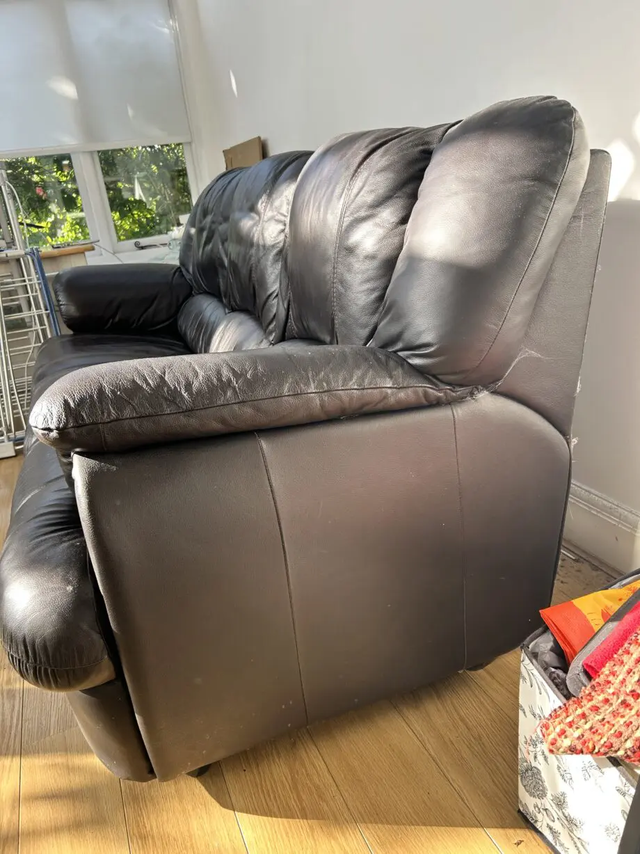 Brown faux leather sofa