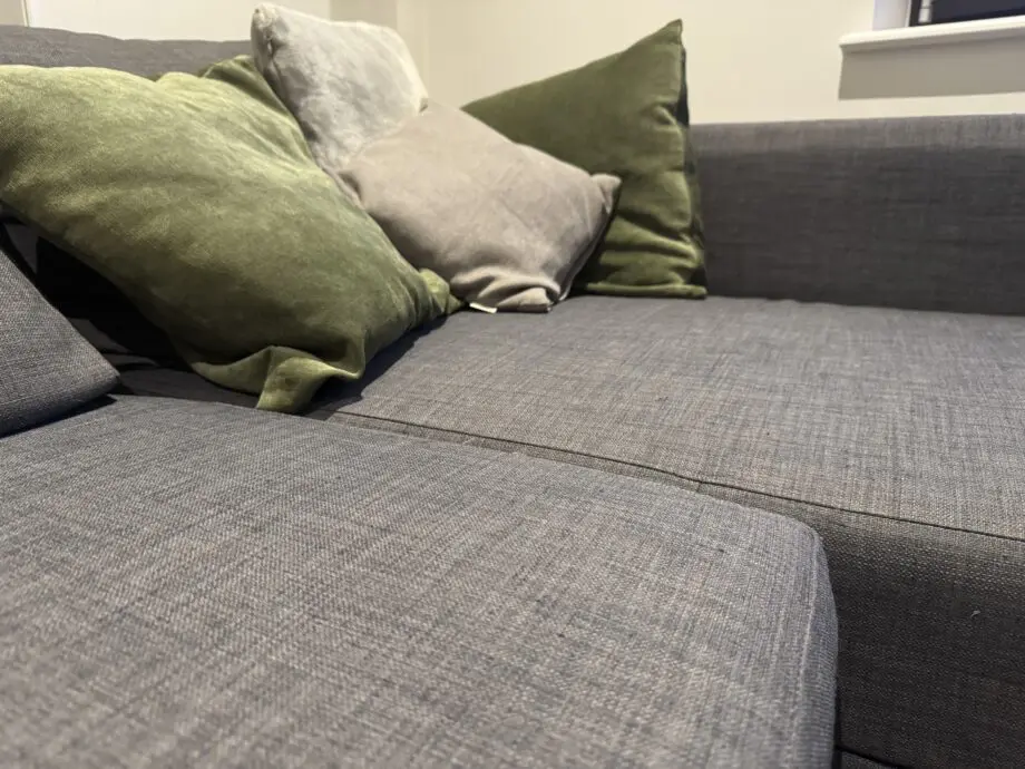 Dark grey Friheten sofa-bed with storage