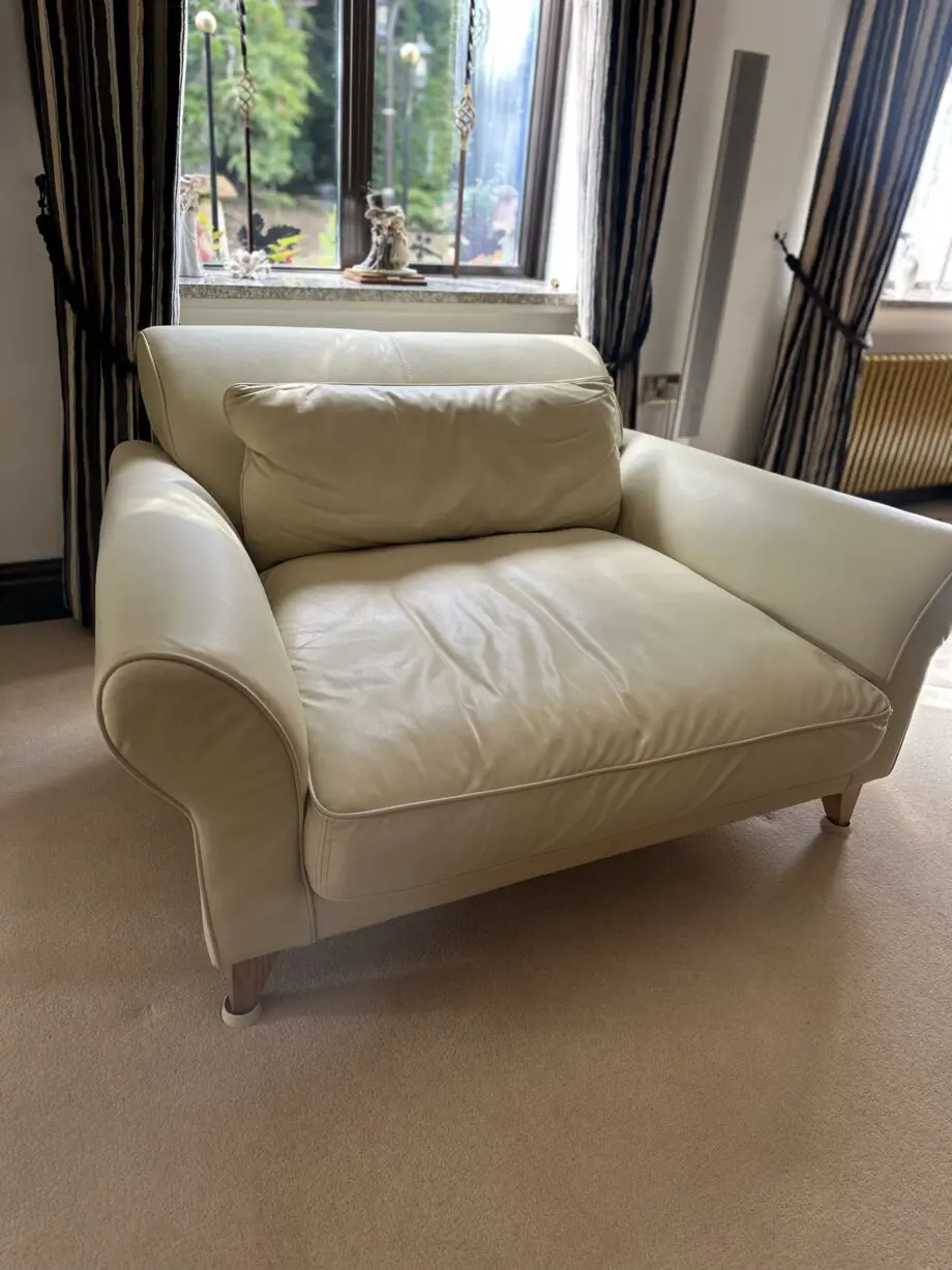 Cream leather loveseat. Jasper Conran, very good condition.