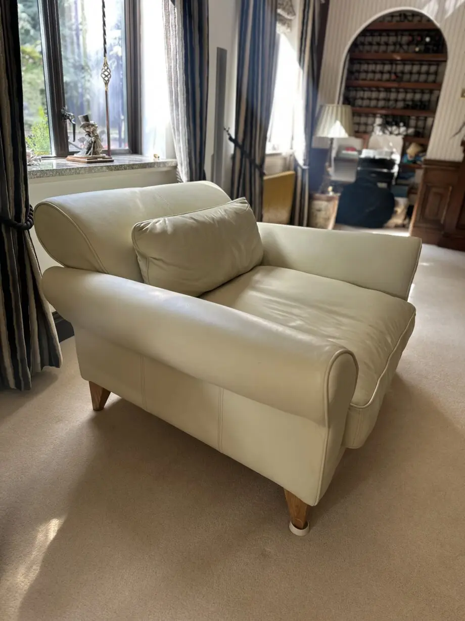 Cream leather loveseat. Jasper Conran, very good condition.