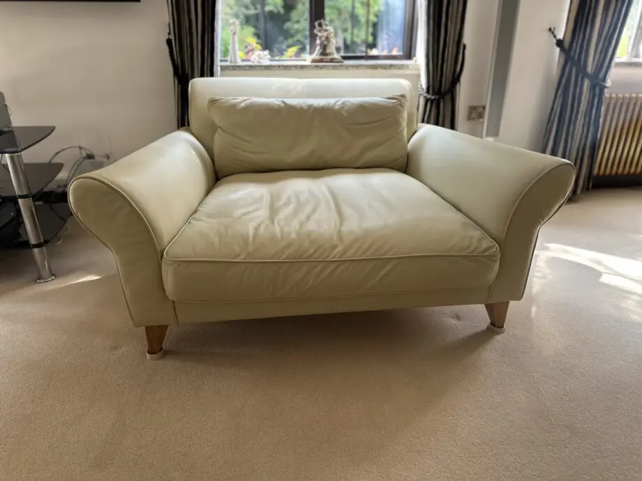 Cream leather loveseat. Jasper Conran, very good condition.