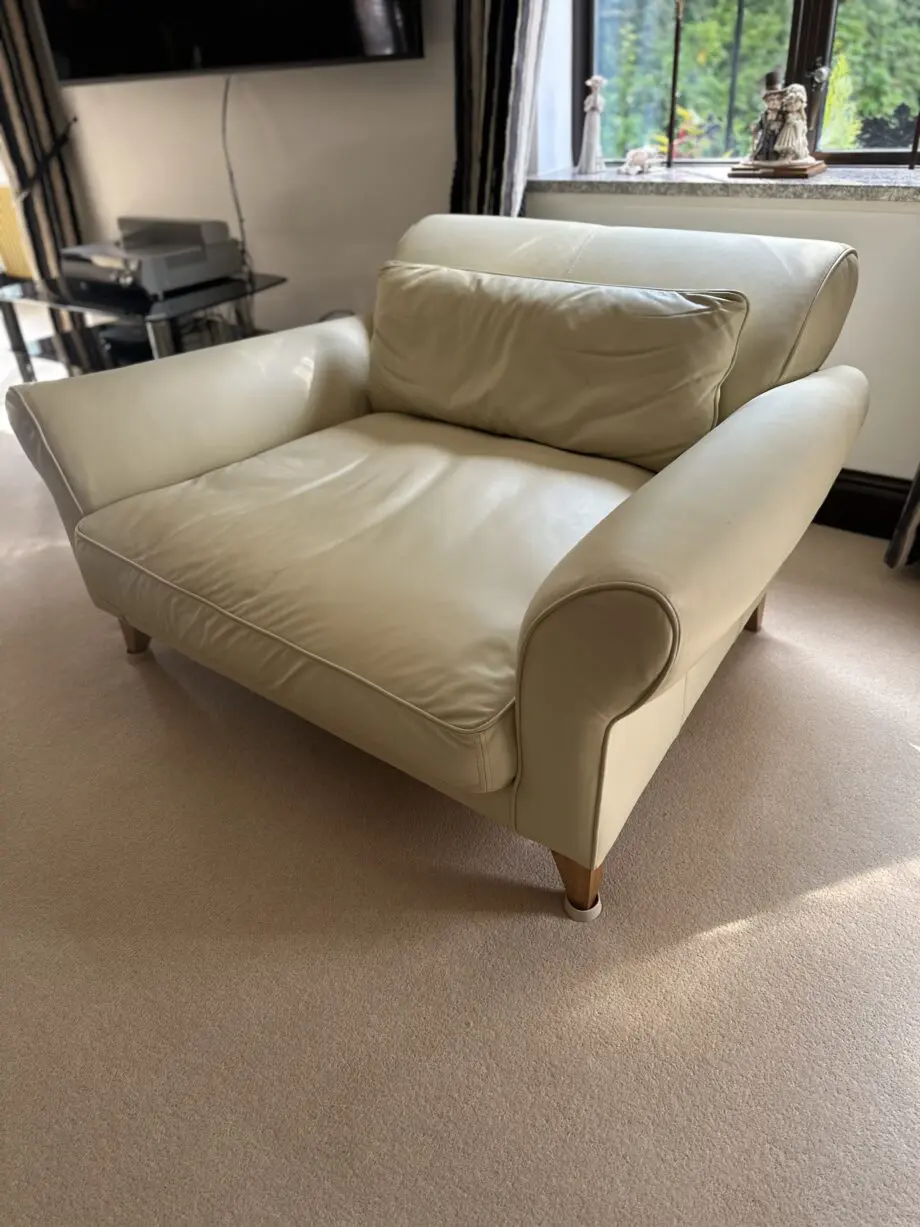 Cream leather loveseat. Jasper Conran, very good condition.