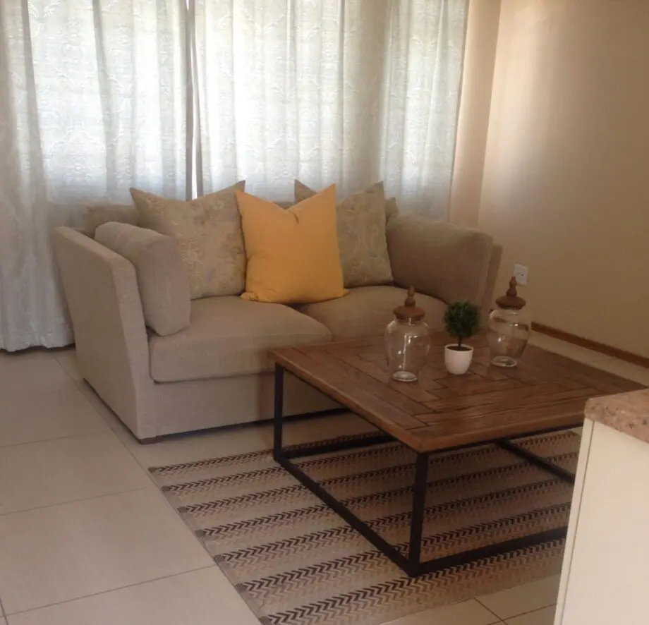 Beige 2 seater couch