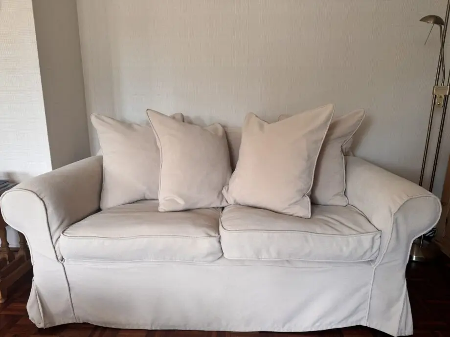 Beige/cream fabric 2-seater sofa