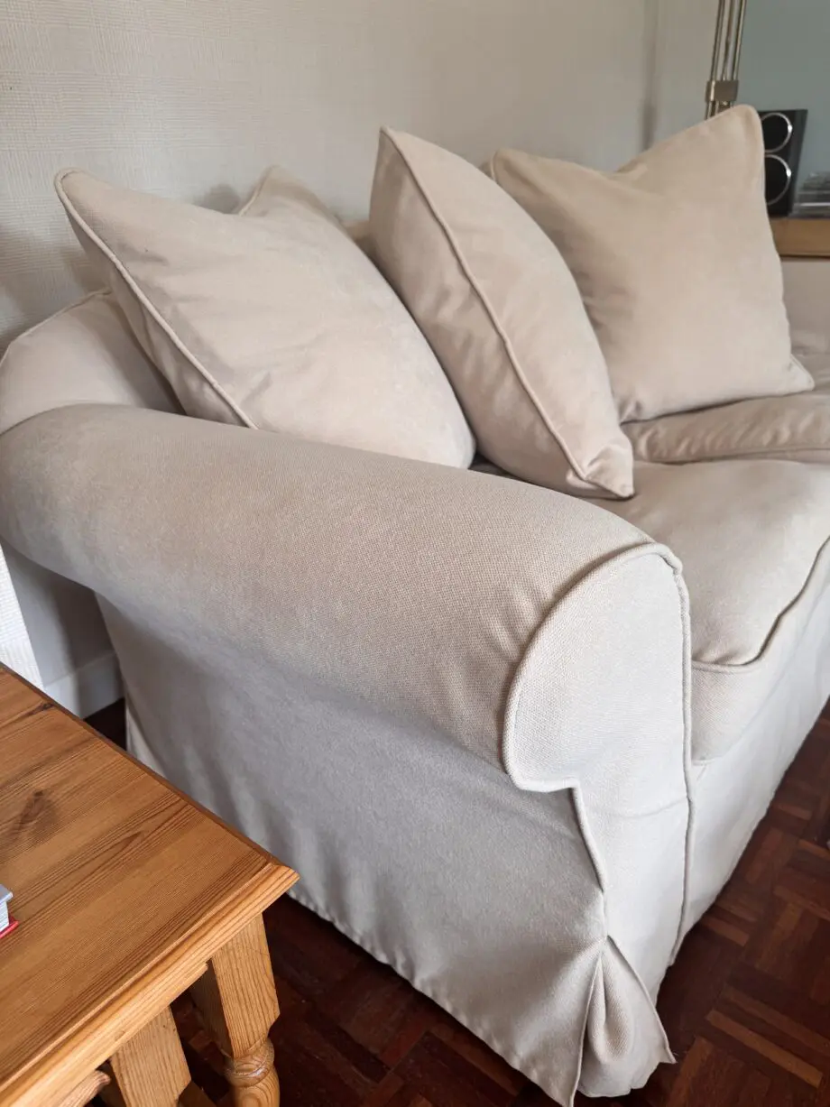Beige/cream fabric 2-seater sofa