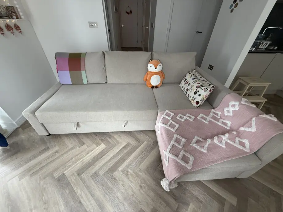 FRIHETEN / KLAGSHAMN Corner sofa-bed with storage, beige/oatmeal