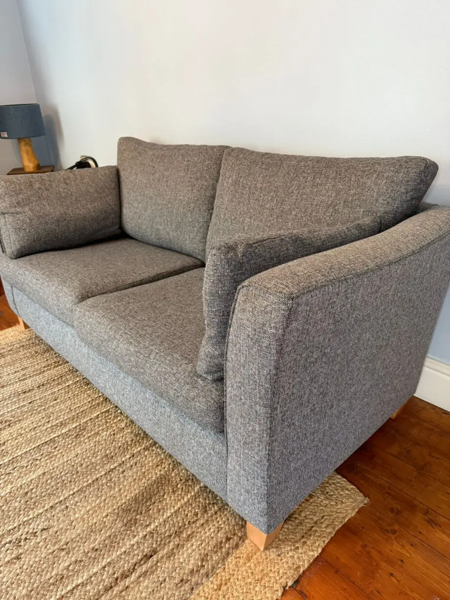 Marks & Spencer’s grey fabric 2 seater sofa. Bought brand new 3 years ago.