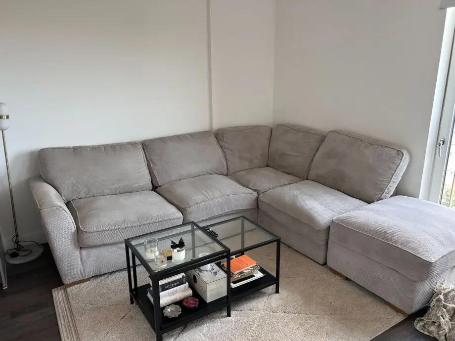 Grey L shaped sofa with Ottoman