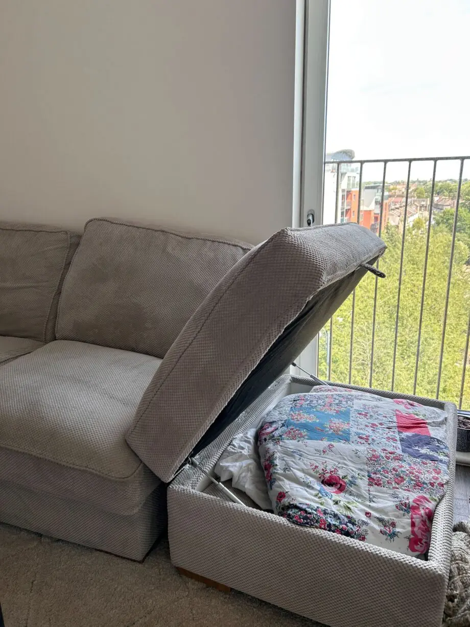 Grey L shaped sofa with Ottoman