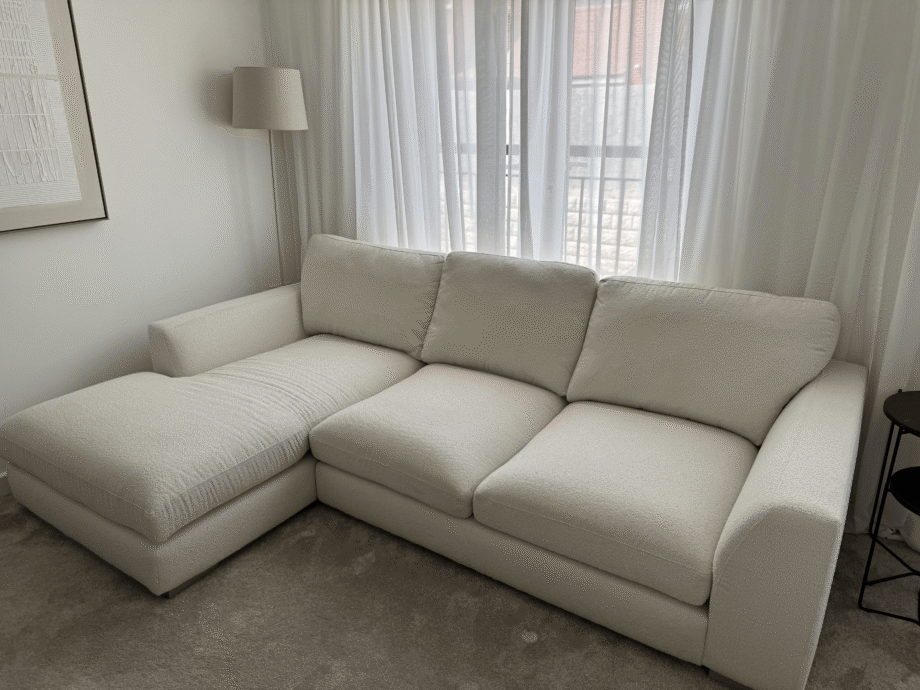 DFS Calix 3 seater sofa with chaise long in ivory boucle with matching footstool