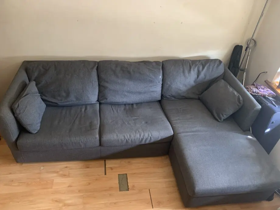 Grey corner sofa bed + storage from MADE