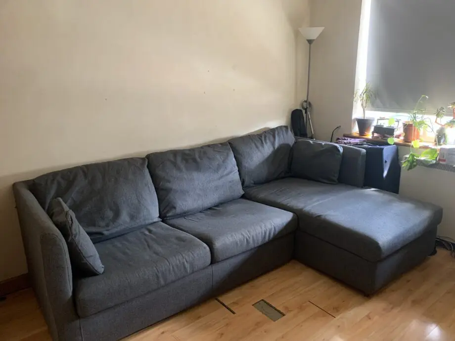 Grey corner sofa bed + storage from MADE