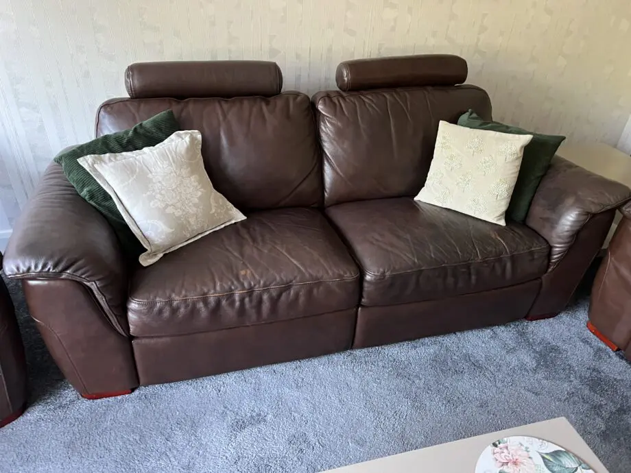 Real leather three piece sofa set.
