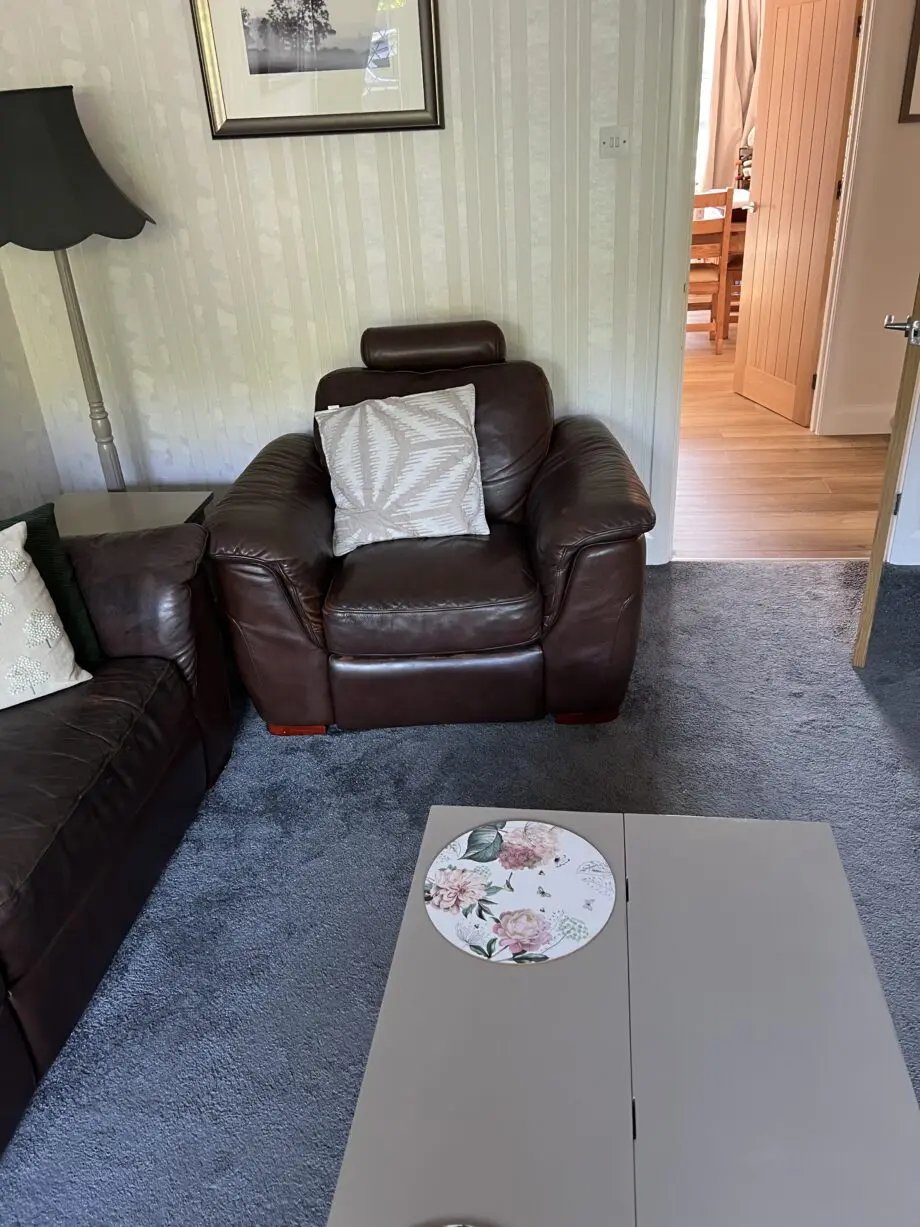 Real leather three piece sofa set.