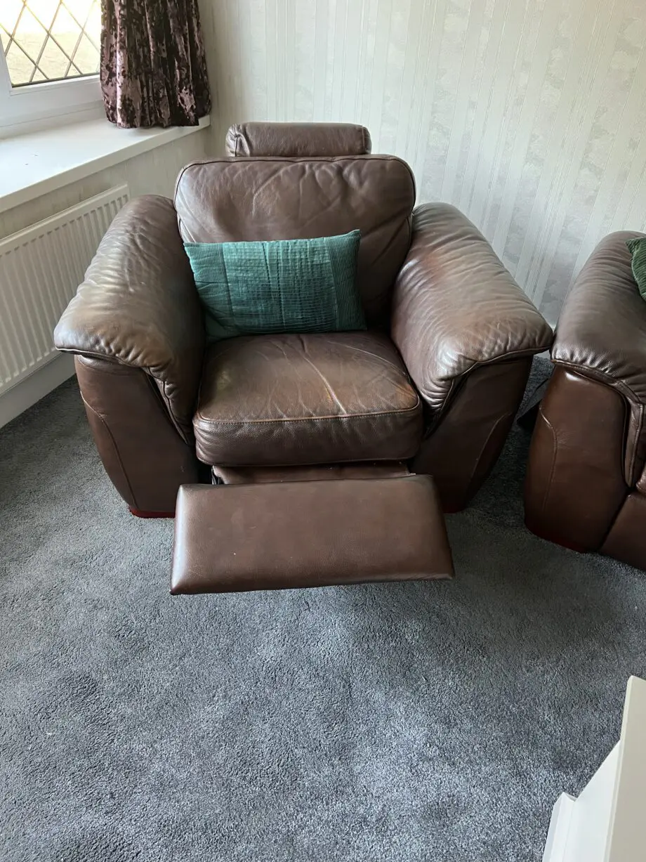 Real leather three piece sofa set.