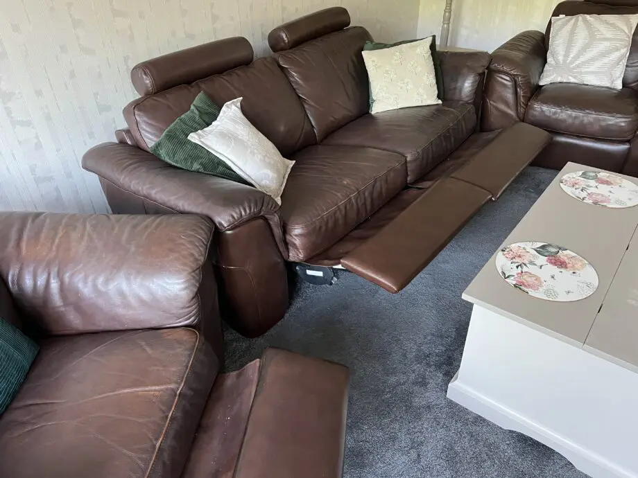 Real leather three piece sofa set.