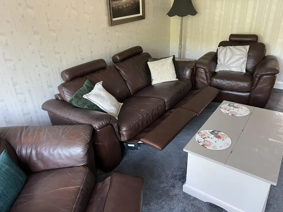 Real leather three piece sofa set.