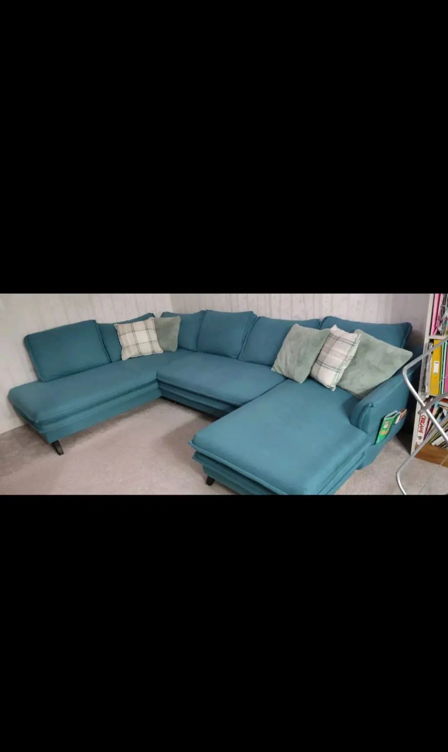 Green corner sofa bed with large storage