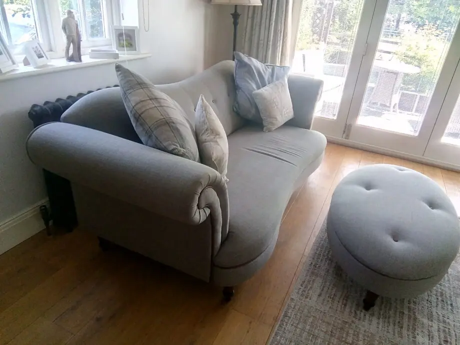DFS Grey 3 seater sofa with matching footstool