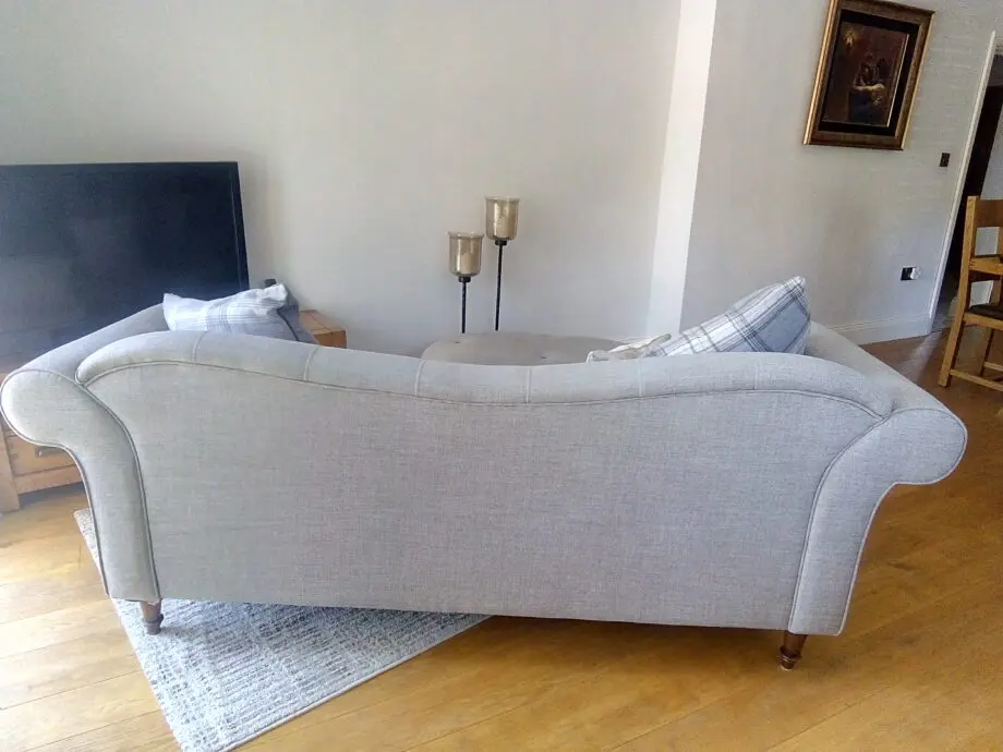 DFS Grey 3 seater sofa with matching footstool