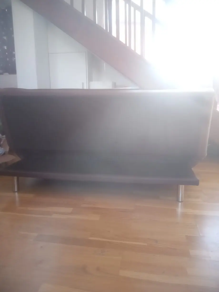 Brown faux leather click clack sofa bed