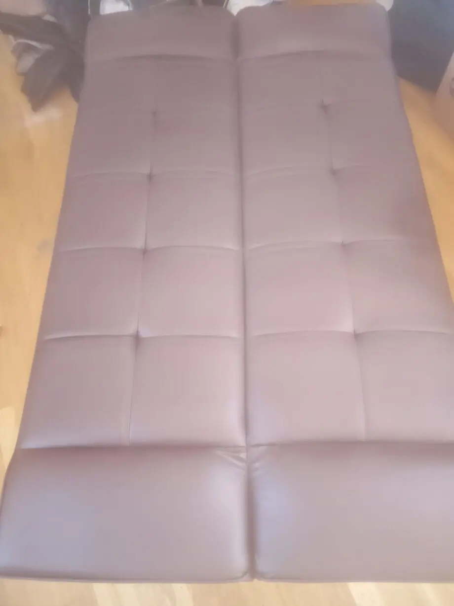 Brown faux leather click clack sofa bed