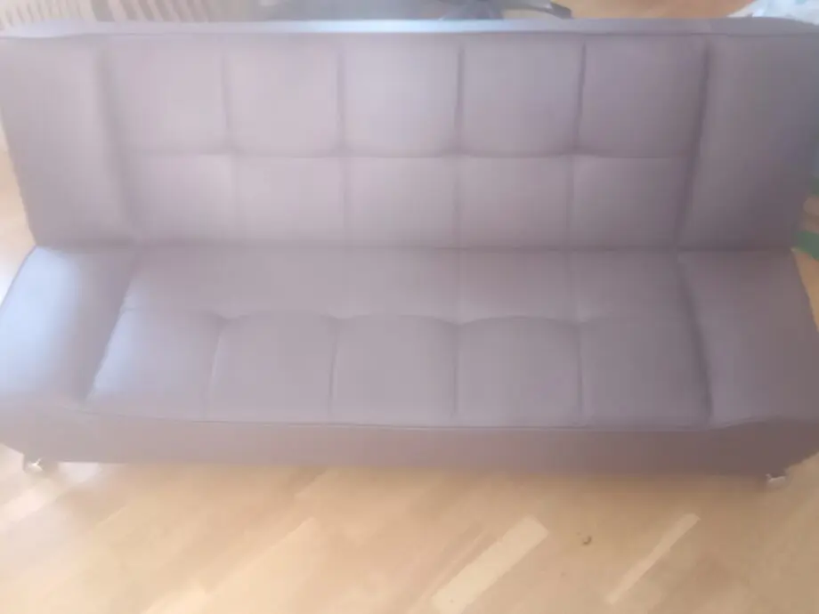 Brown faux leather click clack sofa bed