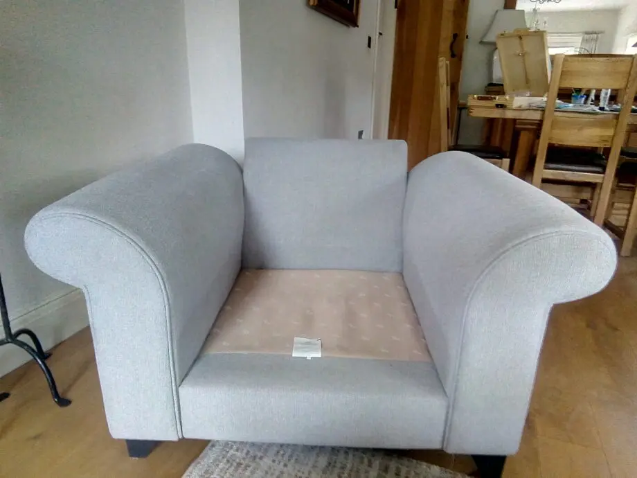 DFS Light grey armchair