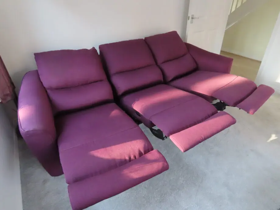 Two 3 seater Power Recliner Sofas