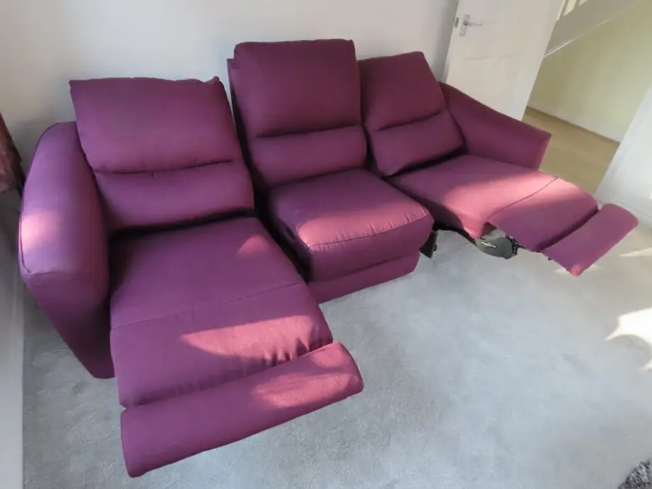 Two 3 seater Power Recliner Sofas