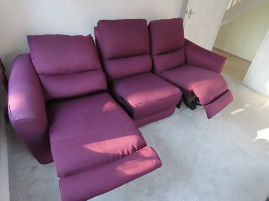 Two 3 seater Power Recliner Sofas