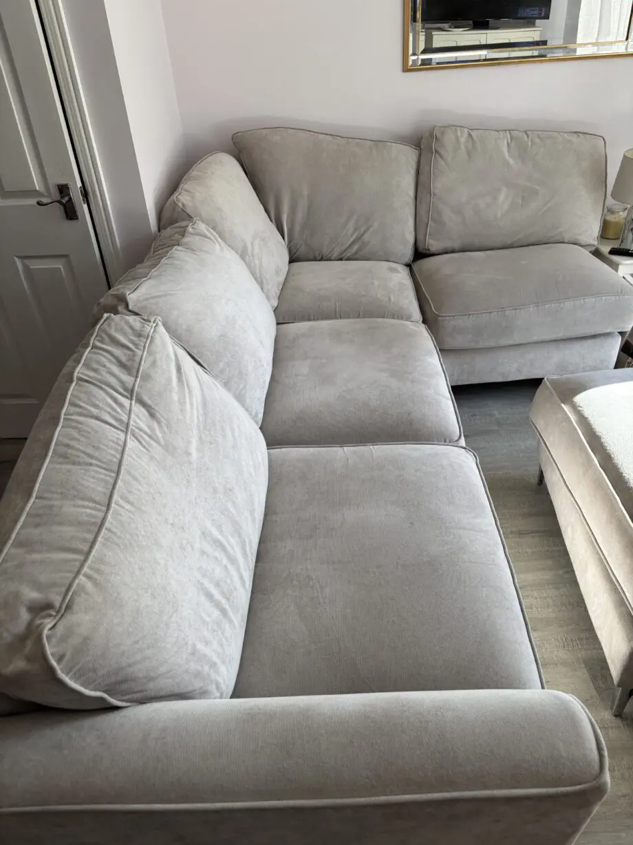 DFS oatmeal corner sofa and foot stool