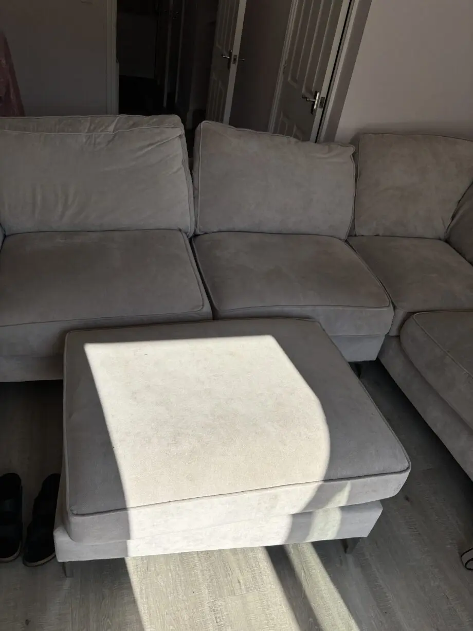 DFS oatmeal corner sofa and foot stool