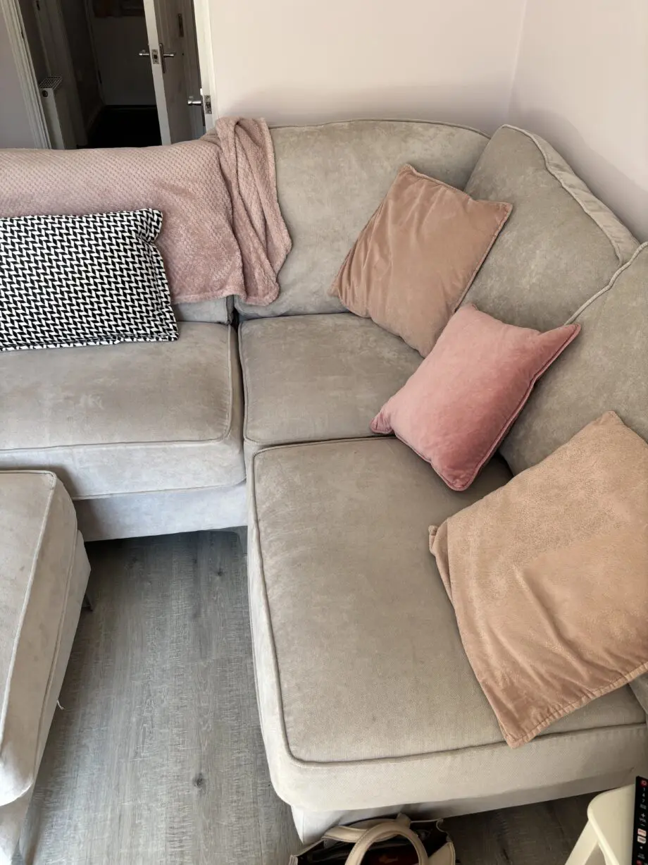 DFS oatmeal corner sofa and foot stool