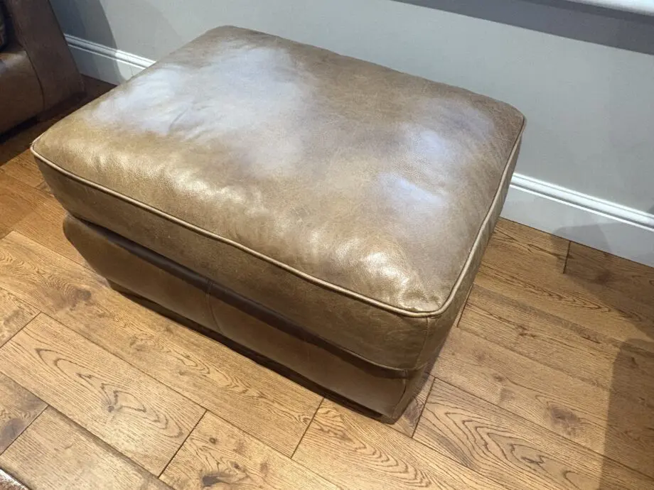 Leather sofas and footstool - furniture village