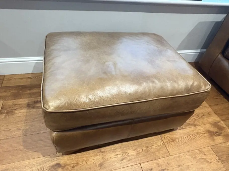 Leather sofas and footstool - furniture village