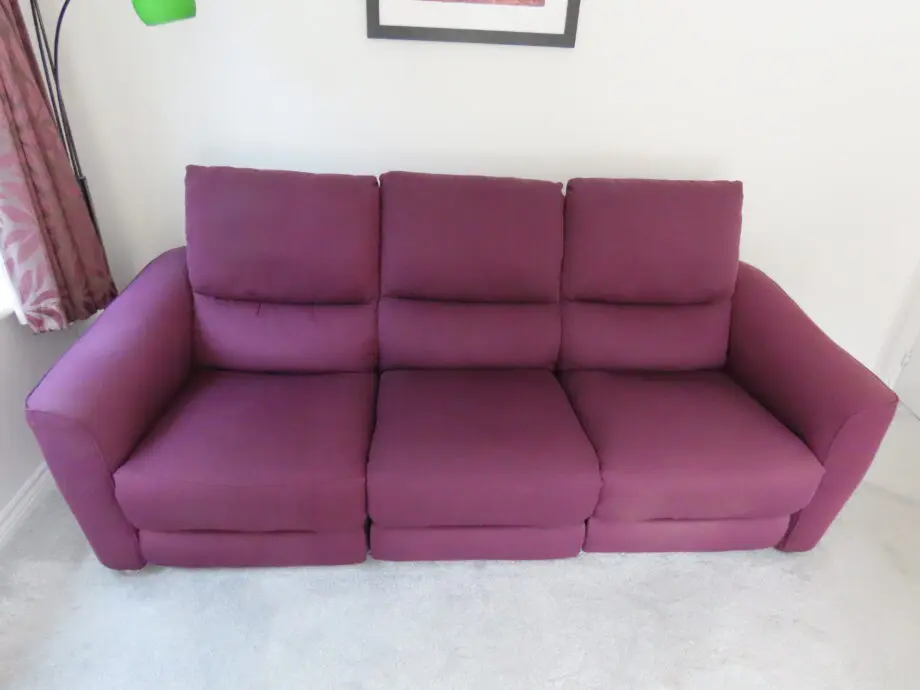 Two 3 seater Power Recliner Sofas